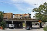 CNW 11186 is shoved across the National Ave. bridge